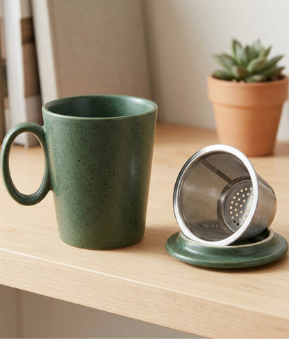 Pjwnx Flared Ceramic Tea Mug with Round-Hole Infuser and Lid 15 oz Forest Cream - Lifestyle view