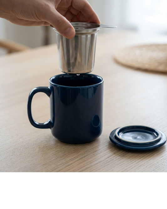 Pjwnx Steepwell Ceramic Tea Mug with Infuser and Lid 14 oz Midnight Blue - Lifestyle view